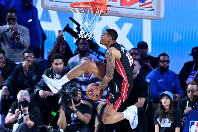 Feb 14, 2026; Los Angeles, CA, USA; Miami Heat forward Keshad Johnson (16) competes in the slam dunk competition during the 2026 NBA All Star Saturday Night at Intuit Dome. Mandatory Credit: William Liang-Imagn Images