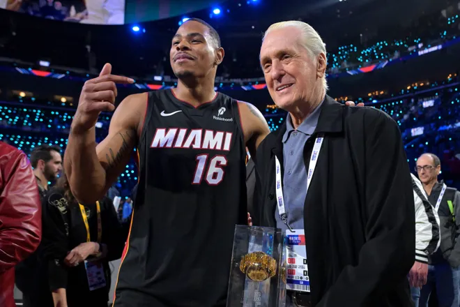 Feb 14, 2026; Los Angeles, CA, USA; Miami Heat forward Keshad Johnson (16) celebrates with the trophy and Pat Riley after winning the slam dunk competition during the 2026 NBA All Star Saturday Night at Intuit Dome. Mandatory Credit: Jayne Kamin-Oncea-Imagn Images