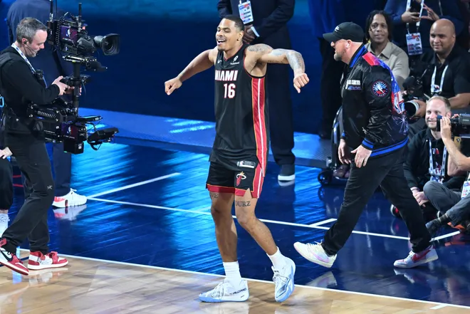 Feb 14, 2026; Los Angeles, CA, USA; Miami Heat forward Keshad Johnson (16) reacts in the slam dunk competition during the 2026 NBA All Star Saturday Night at Intuit Dome. Mandatory Credit: William Liang-Imagn Images