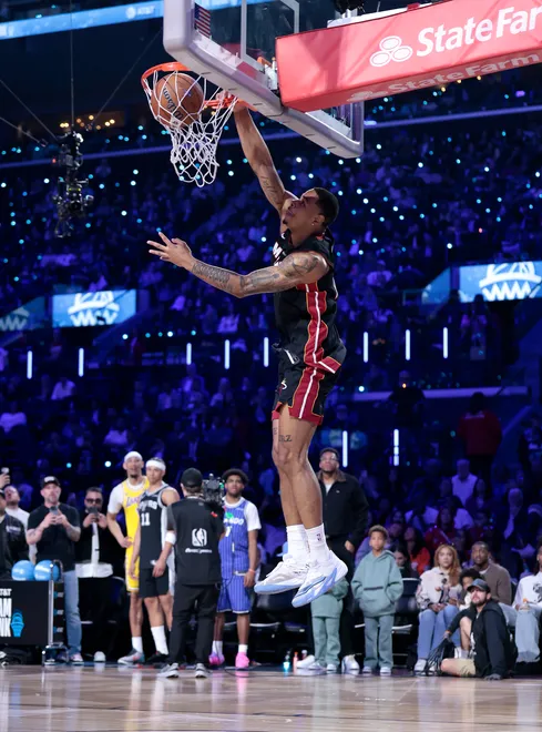 INGLEWOOD, CALIFORNIA - FEBRUARY 14: Keshad Johnson #16 of the Miami Heat dunks during the AT&T Slam Dunk Contest during 2026 NBA All-Star Weekend at Intuit Dome on February 14, 2026 in Inglewood, California. NOTE TO USER: User expressly acknowledges and agrees that, by downloading and or using this photograph, User is consenting to the terms and conditions of the GettyImages License Agreement. (Photo by Ronald Martinez/Getty Images)