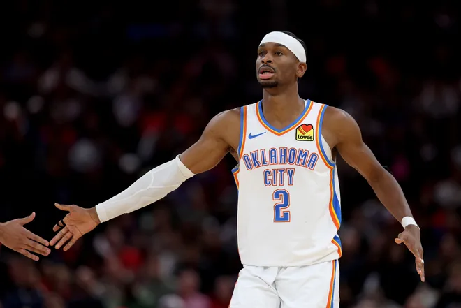 HOUSTON, TEXAS - JANUARY 15: Shai Gilgeous-Alexander #2 of the Oklahoma City Thunder shakes hands with teammates during the game against the Houston Rockets at Toyota Center on January 15, 2026 in Houston, Texas. User expressly acknowledges and agrees that, by downloading and or using this photograph, User is consenting to the terms and conditions of the Getty Images License Agreement. (Photo by Kenneth Richmond/Getty Images)