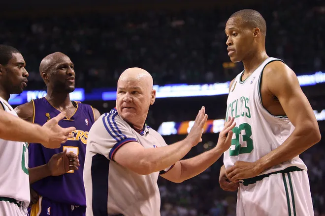 BOSTON - JUNE 17: Referee Joe Crawford holds back P.J. Brown #93 of the Boston Celtics as Lamar Odom #7 of the Los Angeles Lakers looks over at Brown in Game Six of the 2008 NBA Finals on June 17, 2008 at TD Banknorth Garden in Boston, Massachusetts. NOTE TO USER: User expressly acknowledges and agrees that, by downloading and/or using this Photograph, user is consenting to the terms and conditions of the Getty Images License Agreement. (Photo by Elsa/Getty Images)