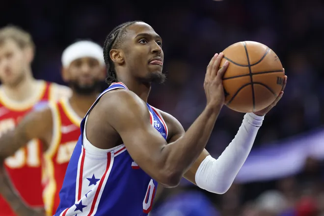 Feb 19, 2026; Philadelphia, Pennsylvania, USA; Philadelphia 76ers guard Tyrese Maxey (0) shoots a foul shot against the Atlanta Hawks during the third quarter at Xfinity Mobile Arena. Mandatory Credit: Bill Streicher-Imagn Images