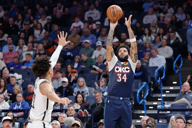Feb 20, 2026; Oklahoma City, Oklahoma, USA; Oklahoma City Thunder guard/forward Kenrich Williams (34) shoots against the Brooklyn Nets during the second half at Paycom Center. Mandatory Credit: Alonzo Adams-Imagn Images
