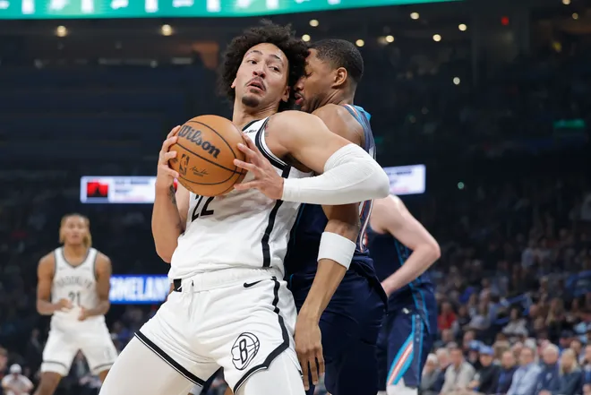 Feb 20, 2026; Oklahoma City, Oklahoma, USA; Brooklyn Nets forward Jalen Wilson (22) drives to the basket against Oklahoma City Thunder guard Aaron Wiggins (21) during the first half at Paycom Center. Mandatory Credit: Alonzo Adams-Imagn Images