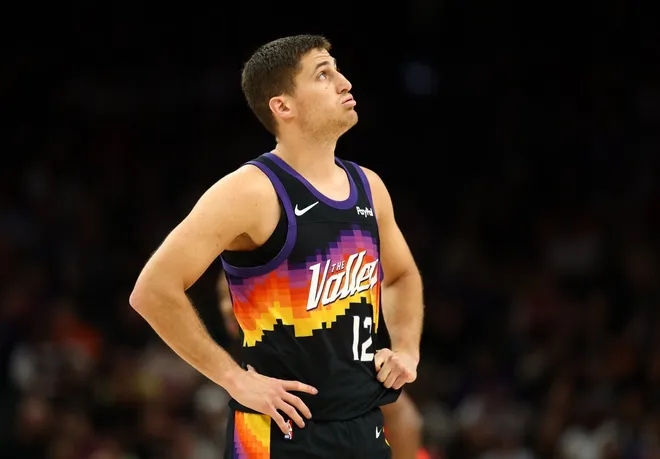 Feb 22, 2026; Phoenix, Arizona, USA; Phoenix Suns guard Collin Gillespie (12) reacts against the Portland Trail Blazers in the second half at Mortgage Matchup Center.