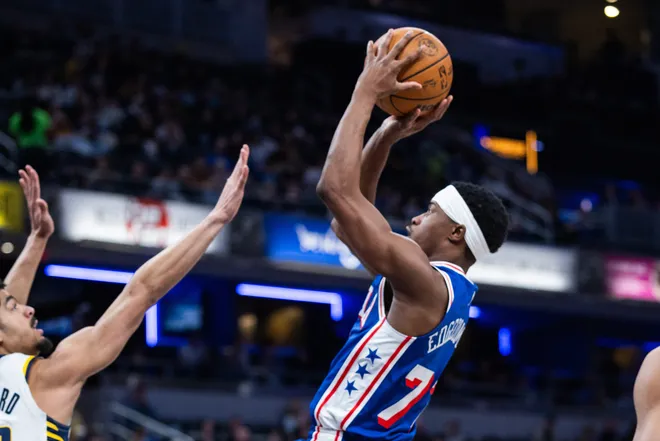 Feb 24, 2026; Indianapolis, Indiana, USA; Philadelphia 76ers guard Vj Edgecombe (77) shoots the ball while Indiana Pacers guard Ben Sheppard (26) defends in the second half at Gainbridge Fieldhouse. Mandatory Credit: Trevor Ruszkowski-Imagn Images