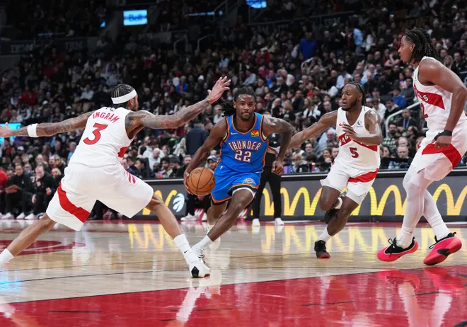 Feb 24, 2026; Toronto, Ontario, CAN; Oklahoma City Thunder guard Cason Wallace (22) dribbles against Toronto Raptors forward Brandon Ingram (3) during the third quarter at Scotiabank Arena. Mandatory Credit: Nick Turchiaro-Imagn Images