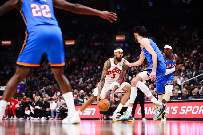 TORONTO, CANADA - FEBRUARY 24: Brandon Ingram #3 of the Toronto Raptors drives to the net against Chet Holmgren #7 of the Oklahoma City Thunder during the first half of their NBA game at Scotiabank Arena on February 24, 2026 in Toronto, Ontario, Canada. NOTE TO USER: User expressly acknowledges and agrees that, by downloading and or using this photograph, User is consenting to the terms and conditions of the Getty Images License Agreement. (Photo by Cole Burston/Getty Images)