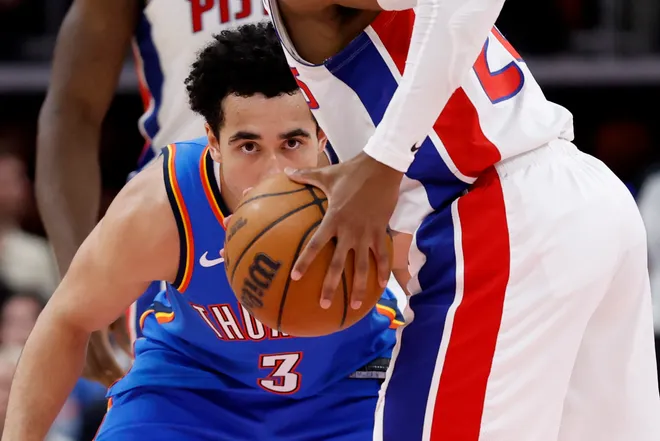 Feb 25, 2026; Detroit, Michigan, USA; Oklahoma City Thunder guard Jared McCain (3) defends against Detroit Pistons guard Daniss Jenkins (24) in the second half at Little Caesars Arena. Mandatory Credit: Rick Osentoski-Imagn Images