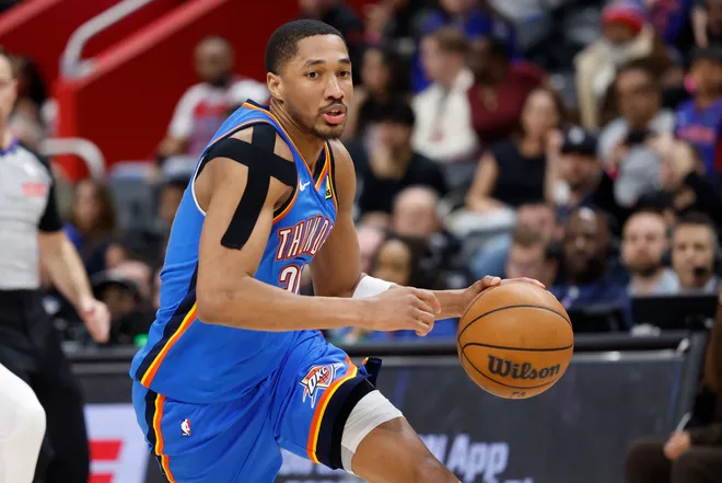 Feb 25, 2026; Detroit, Michigan, USA; Oklahoma City Thunder guard Aaron Wiggins (21) dribbles in the second half against the Detroit Pistons at Little Caesars Arena. Mandatory Credit: Rick Osentoski-Imagn Images
