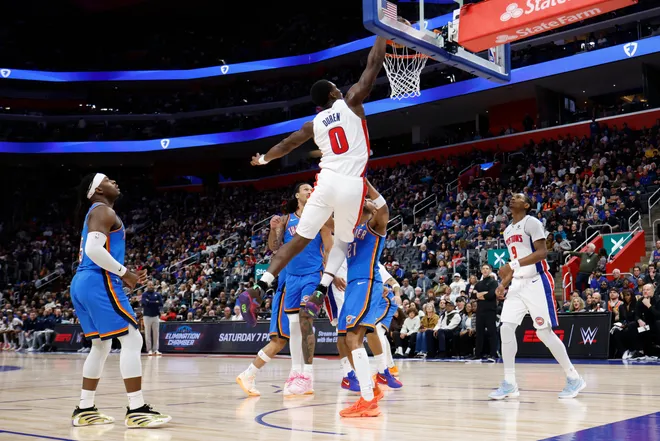 Feb 25, 2026; Detroit, Michigan, USA; Detroit Pistons center Jalen Duren (0) dunks in the first half against the Oklahoma City Thunder at Little Caesars Arena. Mandatory Credit: Rick Osentoski-Imagn Images