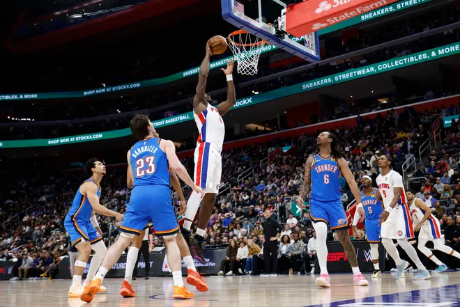 Feb 25, 2026; Detroit, Michigan, USA; Detroit Pistons center Jalen Duren (0) dunks in the first half against the Oklahoma City Thunder at Little Caesars Arena. Mandatory Credit: Rick Osentoski-Imagn Images