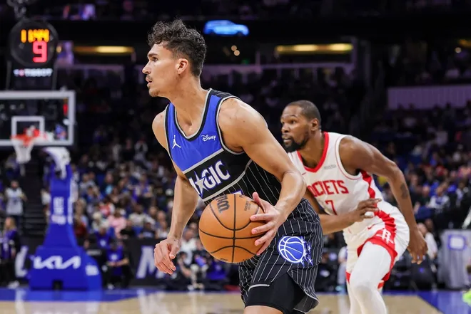 Feb 26, 2026; Orlando, Florida, USA; Orlando Magic forward Tristan da Silva (23) drives to the basket in front of Houston Rockets forward Kevin Durant (7) during the first quarter at Kia Center.