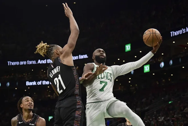 Feb 27, 2026; Boston, Massachusetts, USA; Boston Celtics guard Jaylen Brown (7) drives to the basket past Brooklyn Nets forward Noah Clowney (21) during the second half at TD Garden.