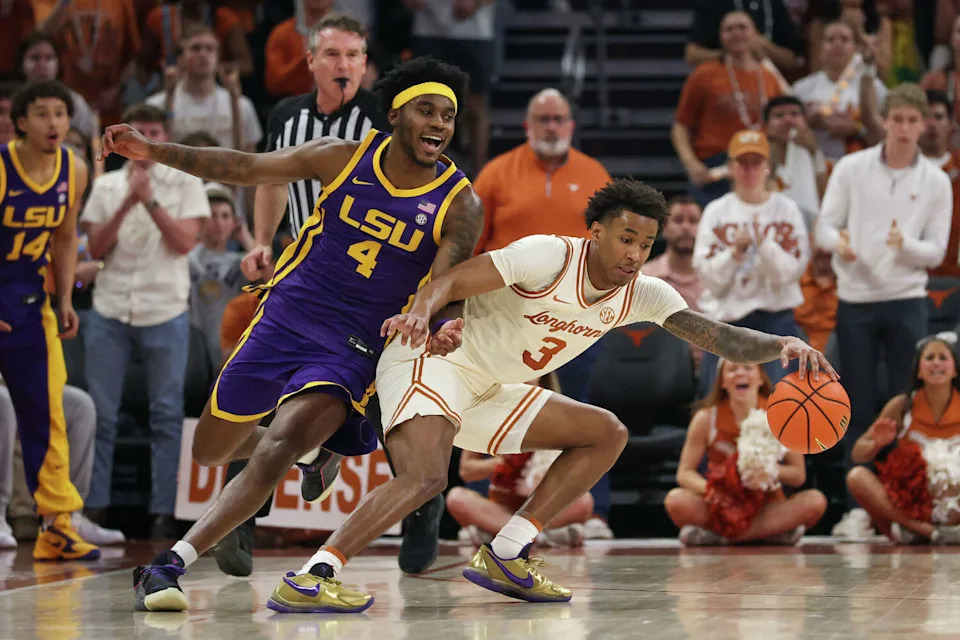 Texas forward Dailyn Swain (3) turns away from the pressure by LSU guard Rashad King on Feb. 17, 2026, at Moody Center in Austin. (Icon Sportswire/Icon Sportswire via Getty Images)