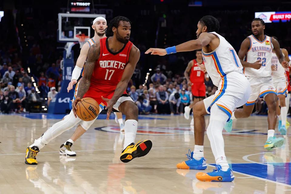 Feb 7, 2026; Oklahoma City, Oklahoma, USA; Houston Rockets forward Tari Eason (17) drives to the basket as Oklahoma City Thunder guard Isaiah Joe (11) defends during the second half at Paycom Center. Mandatory Credit: Alonzo Adams-Imagn Images