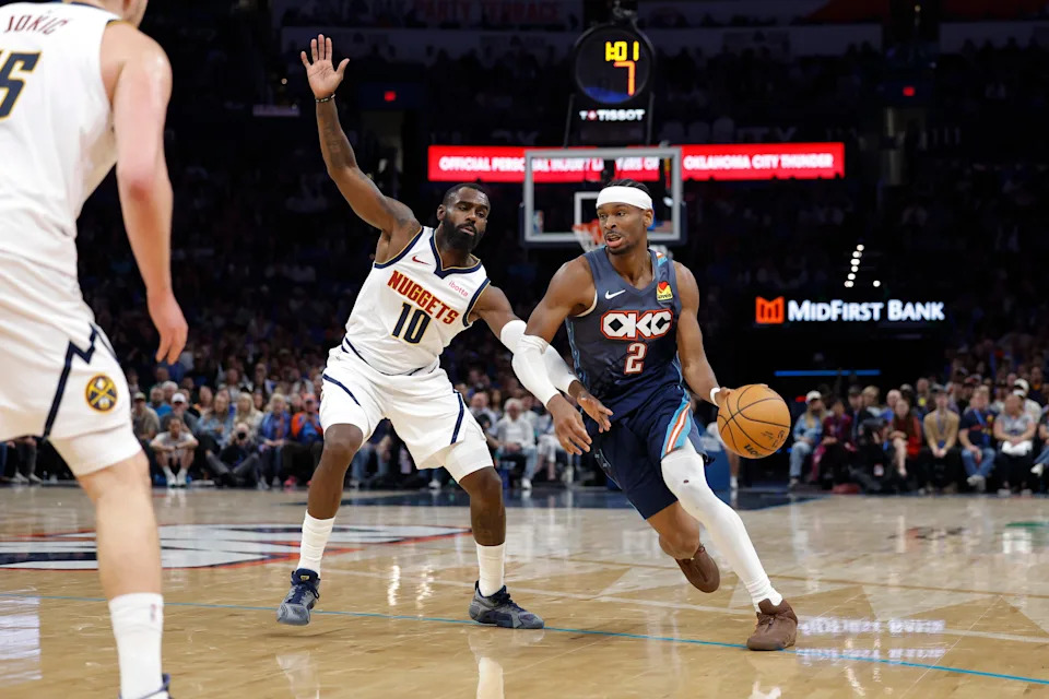 Feb 27, 2026; Oklahoma City, Oklahoma, USA; Oklahoma City Thunder guard Shai Gilgeous-Alexander (2) drives around Denver Nuggets guard/forward Tim Hardaway Jr. (10) during the third quarter at Paycom Center. Mandatory Credit: Alonzo Adams-Imagn Images