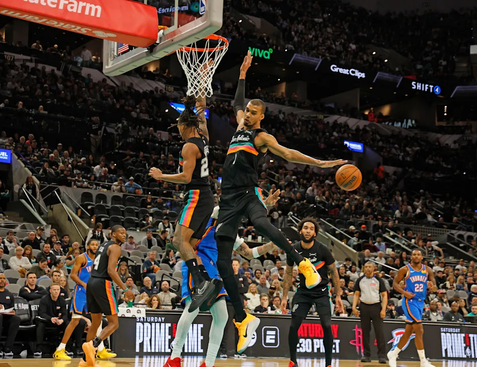 SAN ANTONIO, TX - FEBRUARY 4: Victor Wembanyama #1 of the San Antonio Spurs reaches for a loose ball against the Oklahoma City Thunder in the second half at Frost Bank Center on February 1, 2026 in San Antonio, Texas. NOTE TO USER: User expressly acknowledges and agrees that, by downloading and or using this photograph, User is consenting to terms and conditions of the Getty Images License Agreement. (Photo by Ronald Cortes/Getty Images)