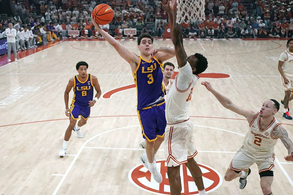 LSU guard Max Mackinnon(3) drives to the basket against Texas forward Nic Codie during the first half at Moody Center on Feb. 17, 2026 in Austin, Texas. (Scott Wachter/Getty Images)