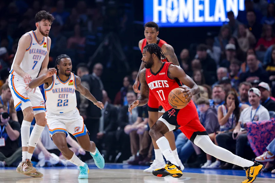 Feb 7, 2026; Oklahoma City, Oklahoma, USA; Houston Rockets forward Tari Eason (17) drives to the basket against Oklahoma City Thunder guard Cason Wallace (22) during the first half at Paycom Center. Mandatory Credit: Alonzo Adams-Imagn Images