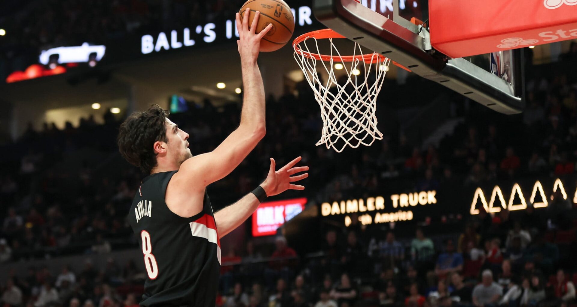 Portland Trail Blazers forward Deni Avdija drives to the basket against the New York Knicks during an NBA basketball game, Sunday, Jan. 11, 2026, in Portland, Ore. (AP Photo/Amanda Loman)