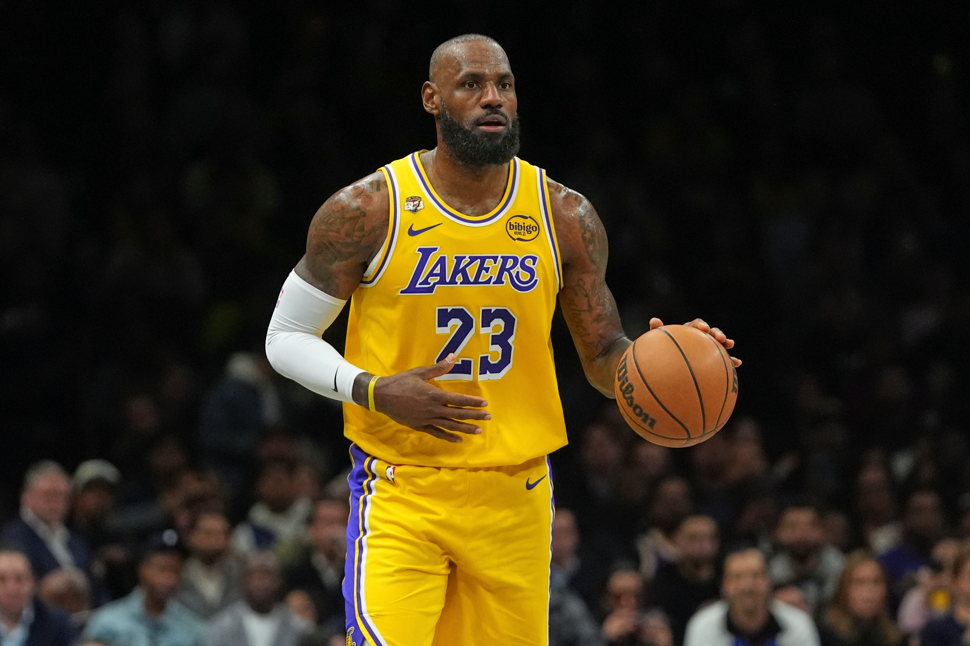 Lakers star LeBron James handles the ball during the first...