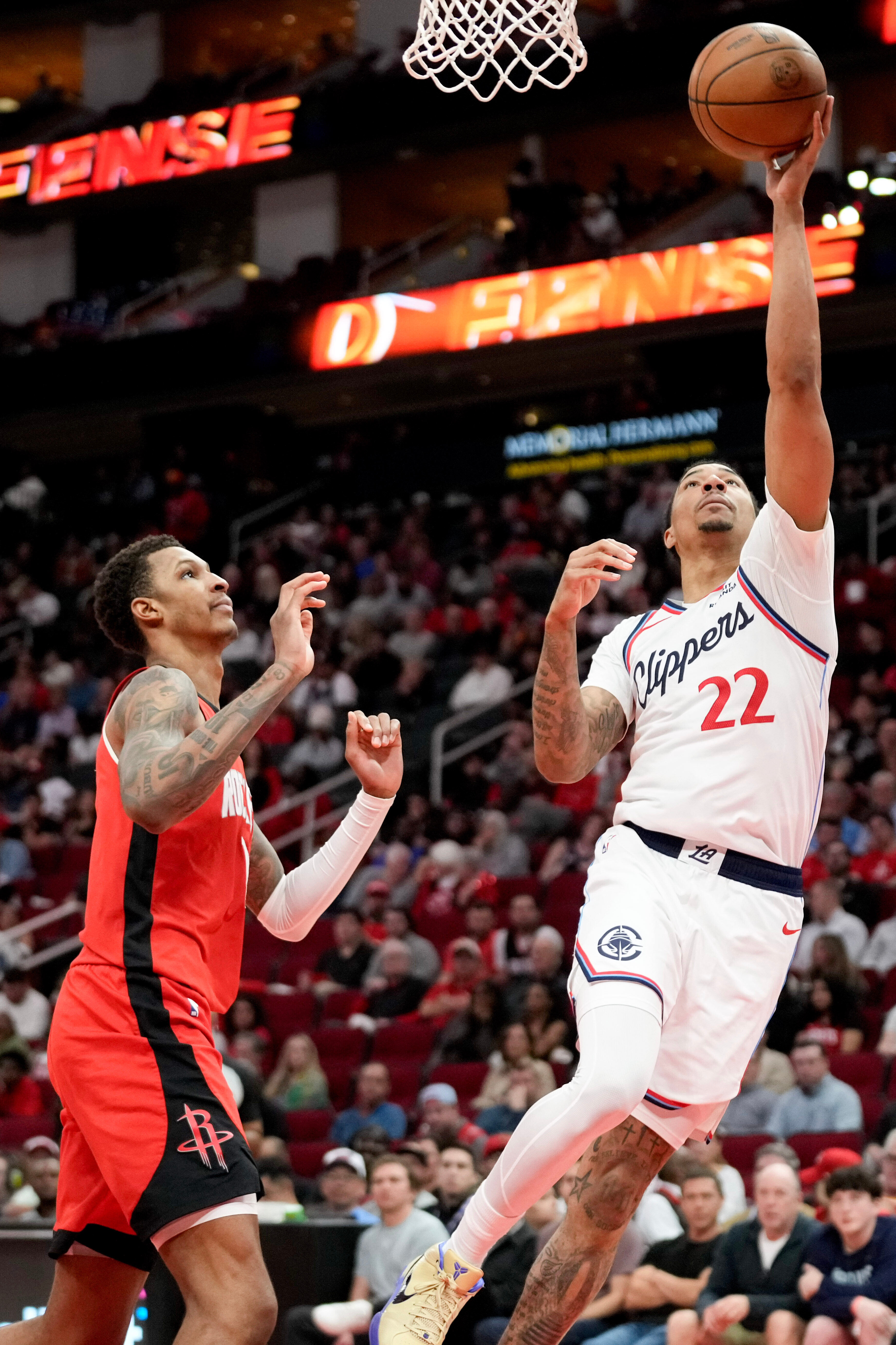 Clippers guard Jordan Miller drives to the basket past Houston...