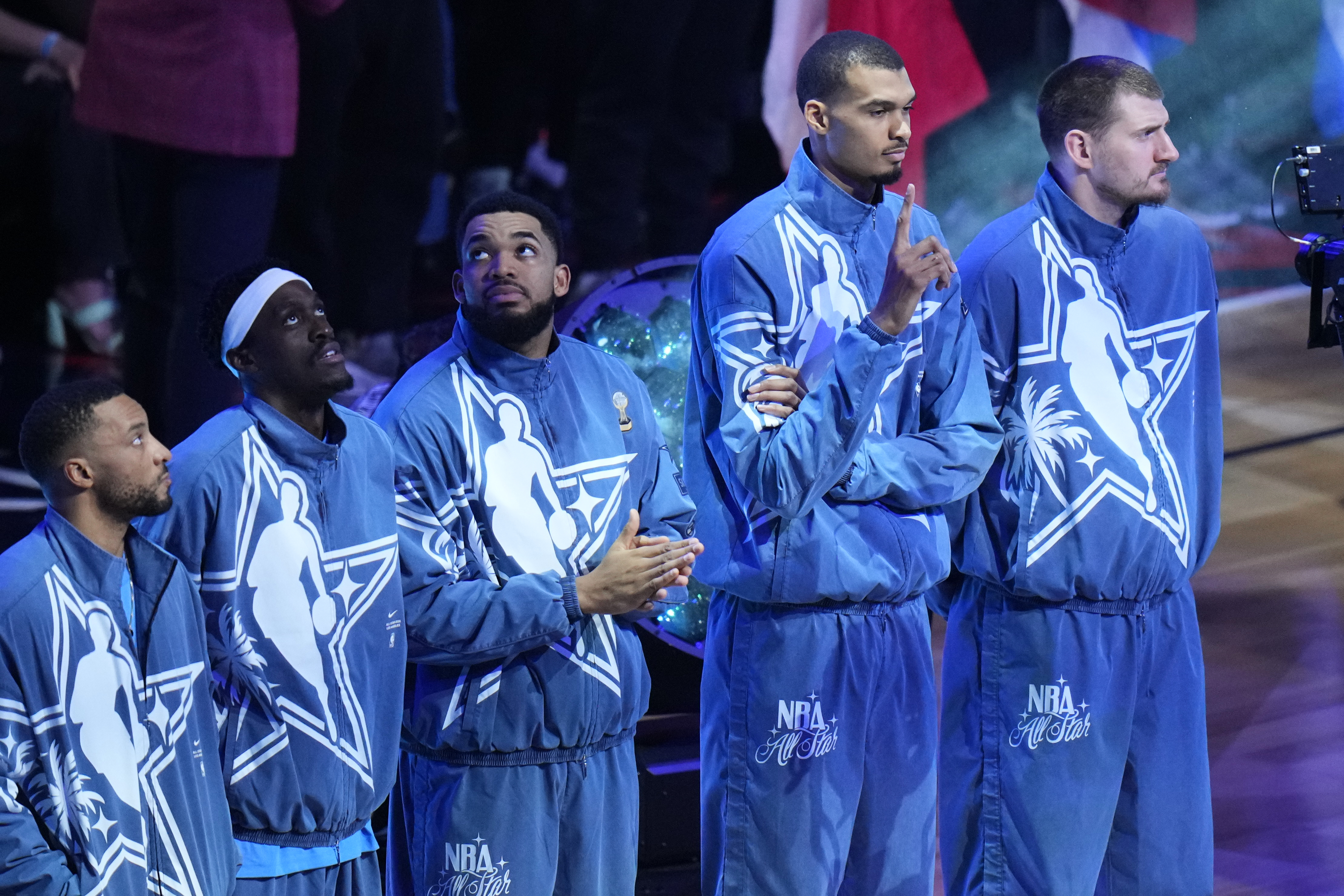 World players line up before the NBA All-Star basketball game...