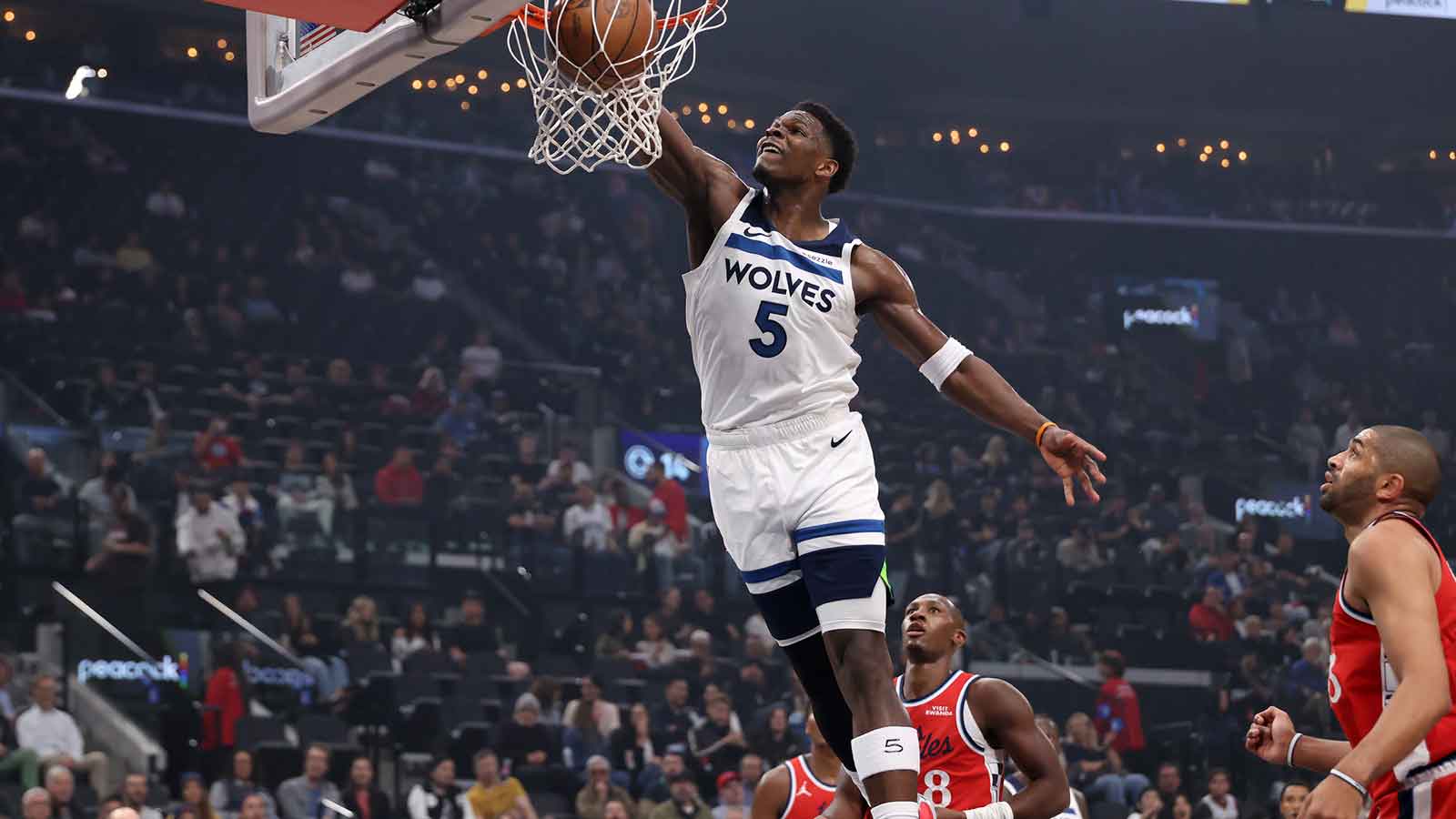 Minnesota Timberwolves guard Anthony Edwards (5) dunks the ball during the first quarter against the Los Angeles Clippers at Intuit Dome.