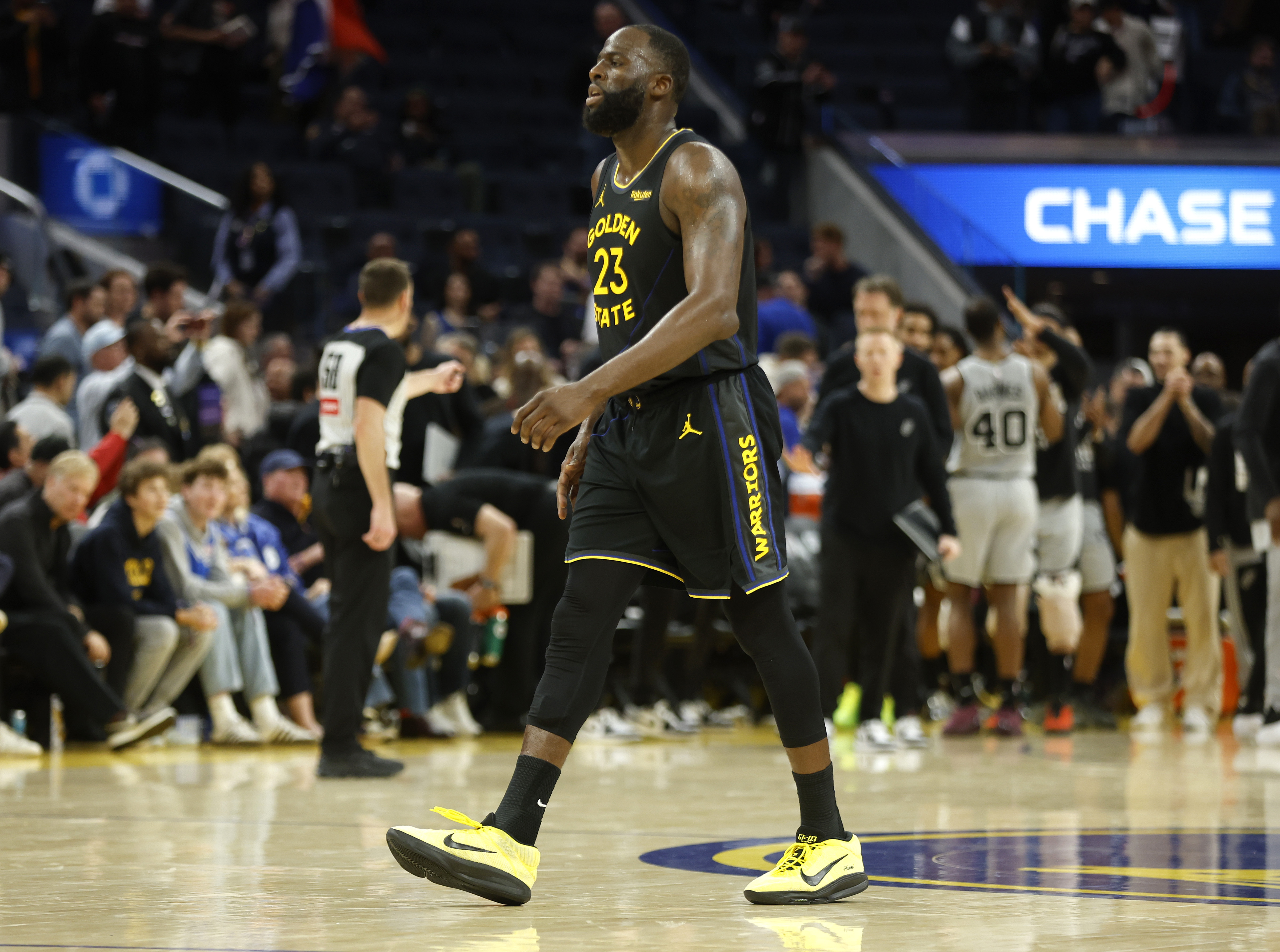 Golden State Warriors' Draymond Green (23) leaves the court following...