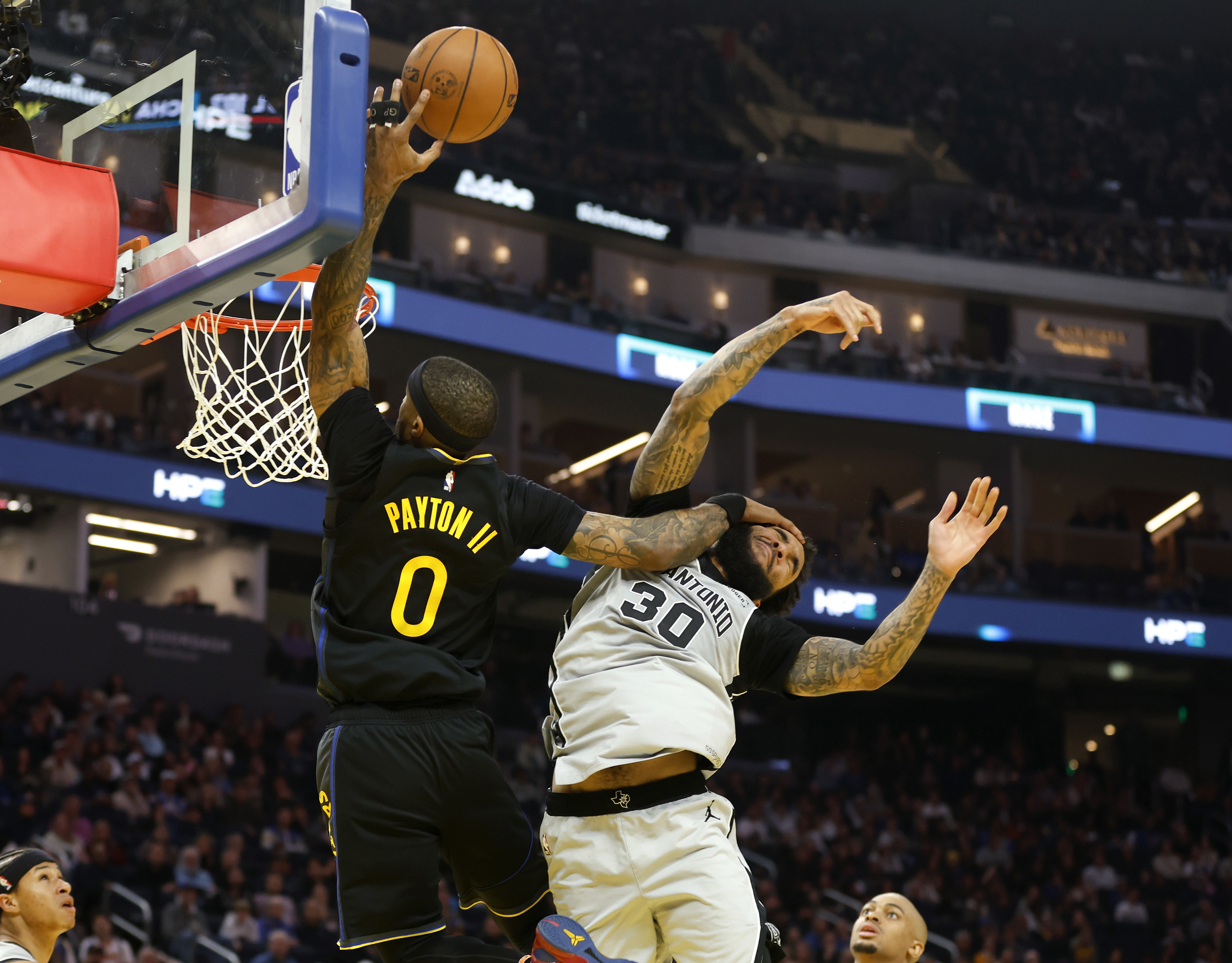 Golden State Warriors' Gary Payton II (0) commits an offensive...