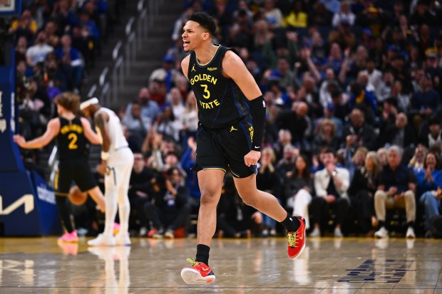 Golden State Warriors' Will Richard (3) reacts after making a 3-point basket in the first quarter of their NBA game at Chase Center in San Francisco, Calif., on Sunday, Feb. 22, 2026. (Jose Carlos Fajardo/Bay Area News Group)