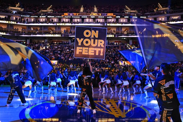 The Dub Squad performs on the court before the start of their NBA game at Chase Center in San Francisco, Calif., on Sunday, Feb. 22, 2026. (Jose Carlos Fajardo/Bay Area News Group)
