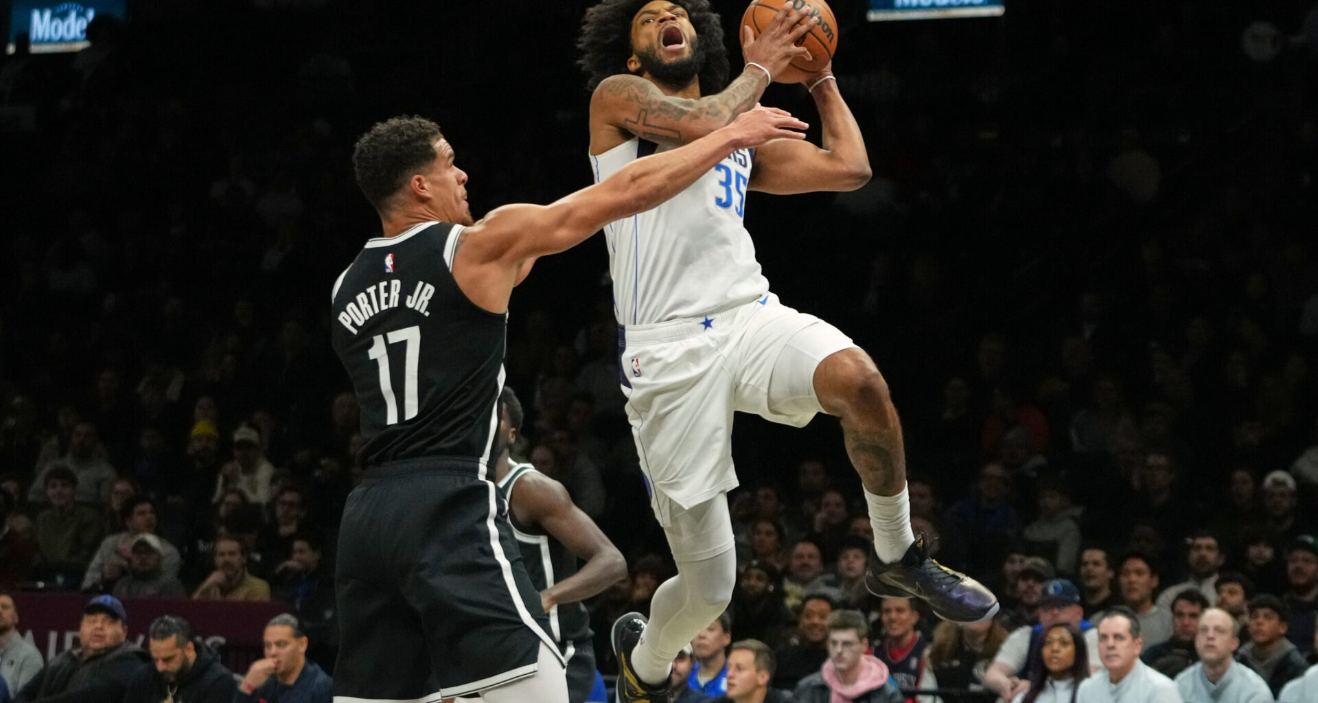 Dallas Mavericks' Marvin Bagley III (35) =do=Brooklyn Nets' Michael Porter Jr. (17) during the first half of an NBA basketball game Tuesday, Feb. 24, 2026, in New York. (AP Photo/Frank Franklin II)