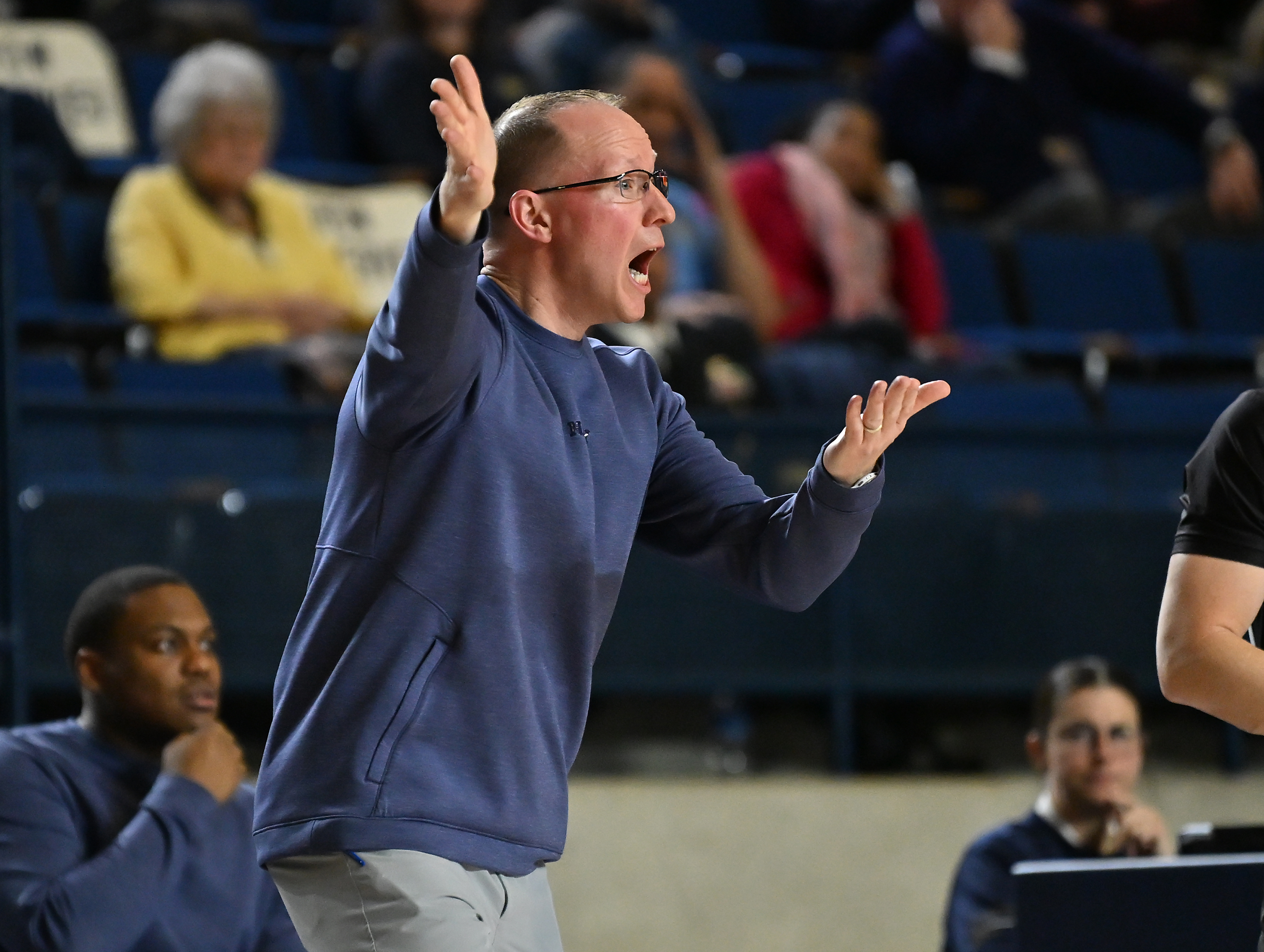Navy Midshipmen head coach Jon Perry reacts to a call during the second half. The Navy Midshipmen defeated the Lehigh Mountain Hawks, 72-49, to become the Patriot League Regular Season Champions in men's NCAA basketball. (Paul W. Gillespie/Staff)