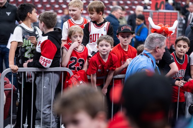 Young fans wait by the Bulls tunnel for autographs ahead of a game against the Portland Trail Blazers at the United Center in Chicago on Feb. 26, 2026. (Josh Boland/Chicago Tribune)