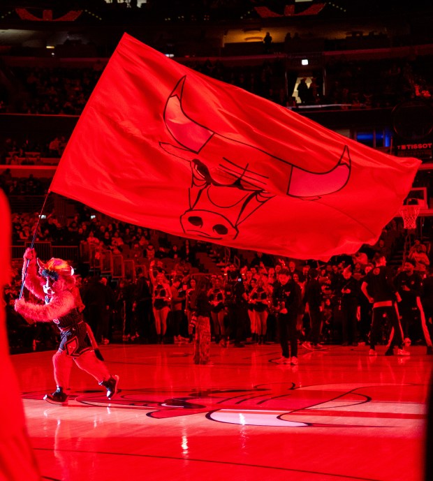 Benny the Bull waves a Bulls flag at half court ahead of a game against the Portland Trail Blazers at the United Center in Chicago on Feb. 26, 2026. (Josh Boland/Chicago Tribune)