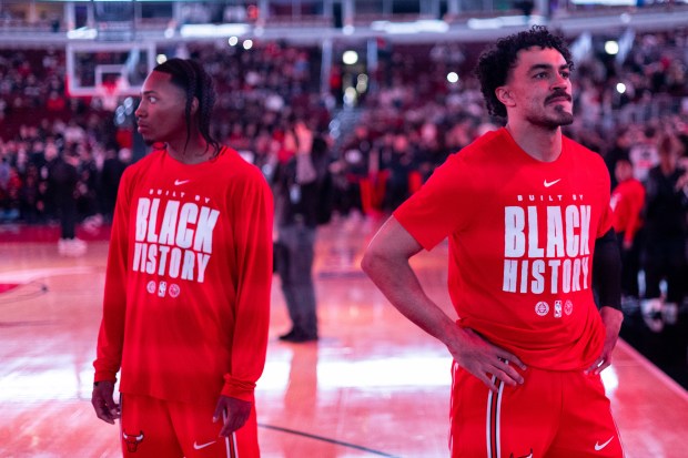 Chicago Bulls guard Rob Dillingham and guard Tre Jones stand on the court ahead of team introductions in the first half of a game against the Portland Trail Blazers at the United Center in Chicago on Feb. 26, 2026. (Josh Boland/Chicago Tribune)