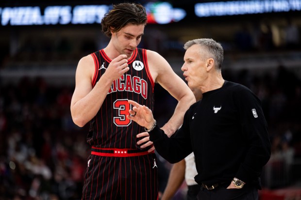 Chicago Bulls guard Josh Giddey (3) speaks with head coach Billy Donovan in the first half of a game against the Portland Trail Blazers at the United Center in Chicago on Feb. 26, 2026. (Josh Boland/Chicago Tribune)