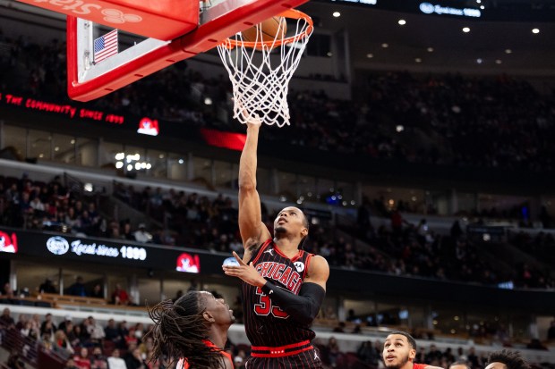 Chicago Bulls forward Isaac Okoro (35) shoots a layup in the first half of a game against the Portland Trail Blazers at the United Center in Chicago on Feb. 26, 2026. (Josh Boland/Chicago Tribune)