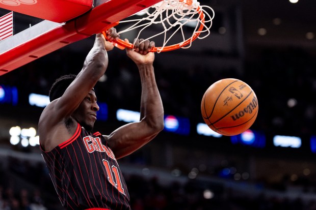 Chicago Bulls forward Leonard Miller (11) dunks in the first half of a game against the Portland Trail Blazers at the United Center in Chicago on Feb. 26, 2026. (Josh Boland/Chicago Tribune)
