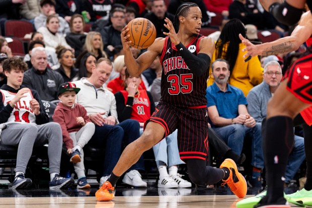 Chicago Bulls forward Isaac Okoro (35) carries the ball in the second half of a game against the Portland Trail Blazers at the United Center in Chicago on Feb. 26, 2026. (Josh Boland/Chicago Tribune)