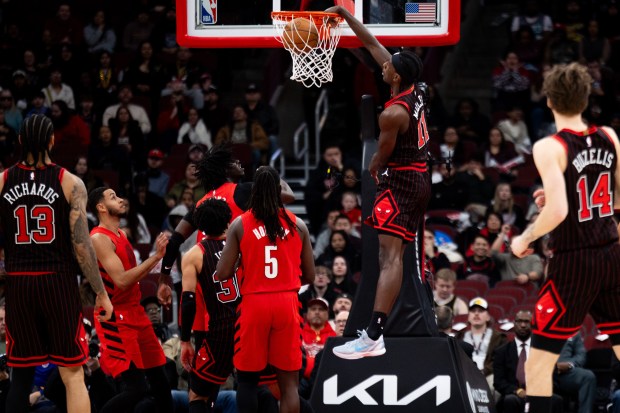Chicago Bulls forward Leonard Miller (11) dunks the ball in the second half of a game against the Portland Trail Blazers at the United Center in Chicago on Feb. 26, 2026. (Josh Boland/Chicago Tribune)