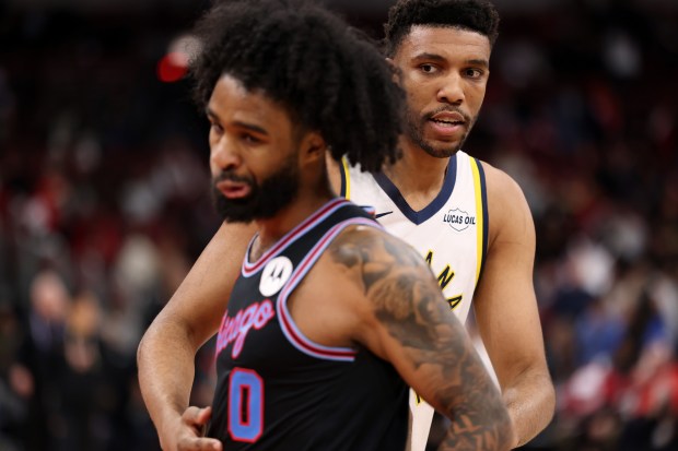 Bulls guard Coby White walks away after greeting Pacers center Tony Bradley following a 120-105 Pacers win Friday, Dec. 5, 2025, at the United Center. (John J. Kim/Chicago Tribune)