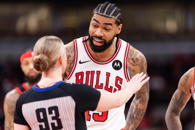 Chicago Bulls center Nick Richards (13) reacts to a foul call by referee Jenna Reneau (93) in the first half of a game against the Toronto Raptors at the United Center in Chicago on Feb. 19, 2026. (Josh Boland/Chicago Tribune)