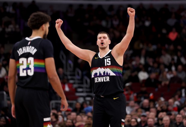Denver Nuggets center Nikola Jokić (15) reacts after scoring in the first half of a game against the Chicago Bulls at the United Center in Chicago on Feb. 7, 2026. (Chris Sweda/Chicago Tribune)