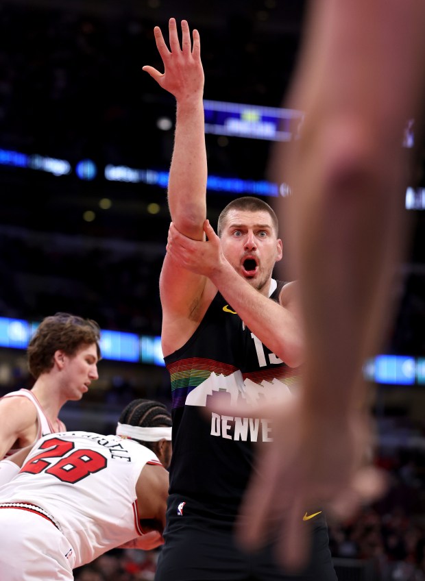 Denver Nuggets center Nikola Jokić (15) argues with a referee after a foul was not called on the Chicago Bulls in the first half of a game at the United Center in Chicago on Feb. 7, 2026. (Chris Sweda/Chicago Tribune)