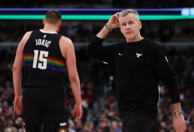 Chicago Bulls Head Coach Billy Donovan walks onto the court during a timeout in the second half of a game against center Nikola Jokić (15) and the Denver Nuggets at the United Center in Chicago on Feb. 7, 2026. (Chris Sweda/Chicago Tribune)
