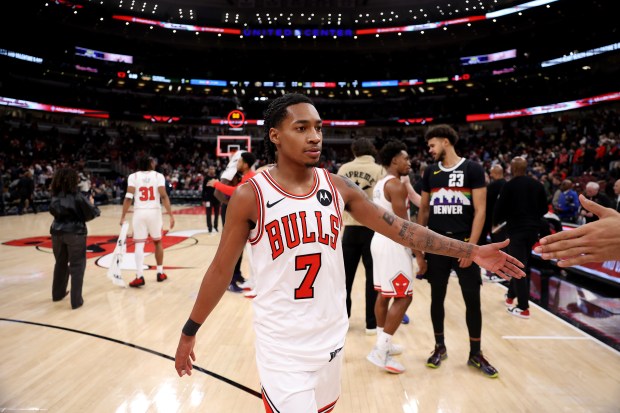 Chicago Bulls guard Rob Dillingham (7) walks off the floor after a loss to the in the Denver Nuggets at the United Center in Chicago on Feb. 7, 2026. (Chris Sweda/Chicago Tribune)